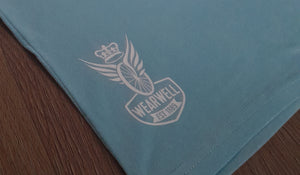 Sky team t-shirt laid flat with wearwell logo close up